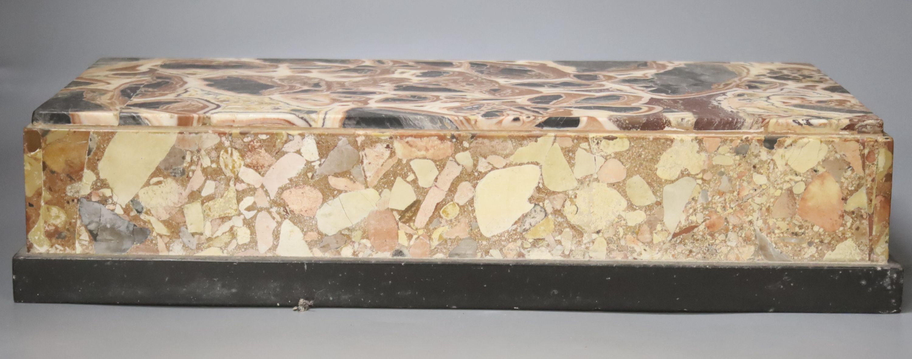 An unusual specimen marble plinth, 48 x 25.5cm